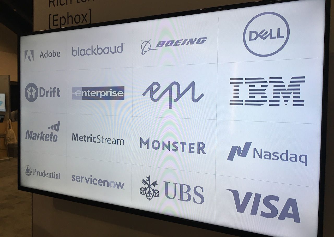 Presentation with logowall of TinyMCE clients including Adobe, Dell, IBM, UBS, and Visa.