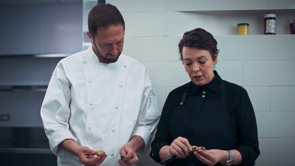 Still photo from FX's The Bear, Season 2, Episode 7. Richie peeling mushrooms with Chef.