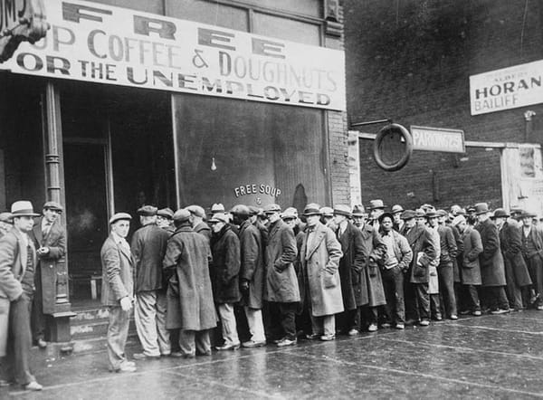 Unemployed men line up in front of a Chicago soup kitchen, which was operated by Al Capone.